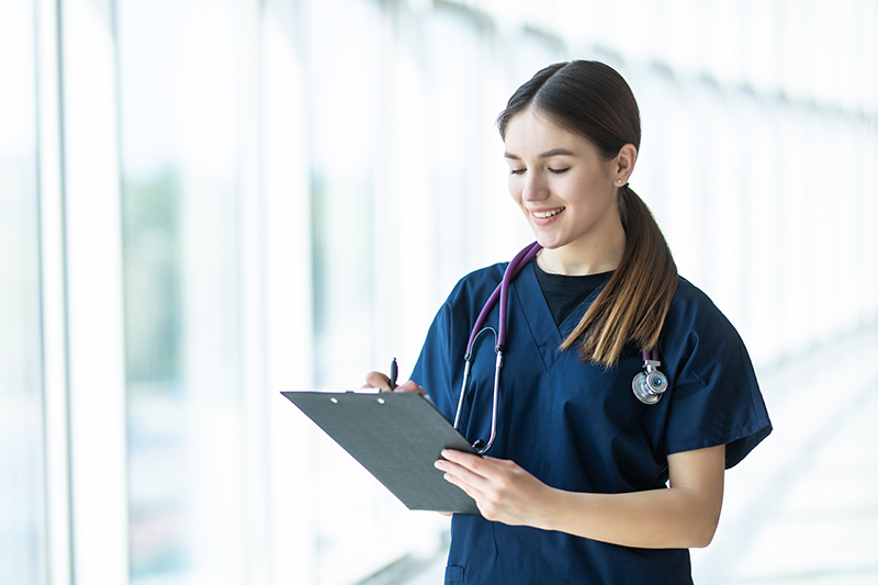 Physician holding a clipboard