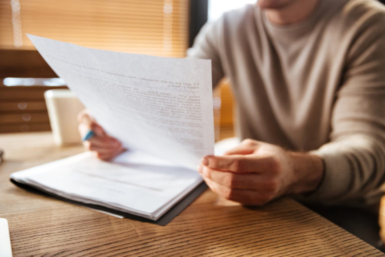 cropped photo attractive young man office working