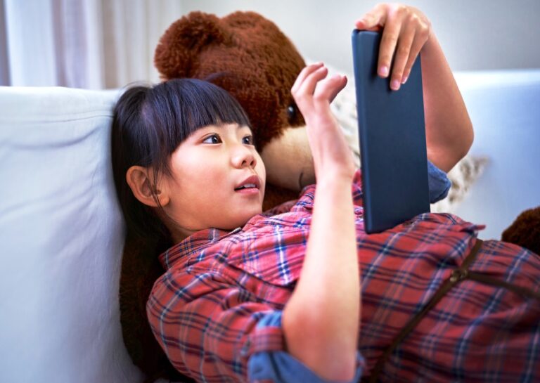 streaming relax child house with tablet movie binge cartoon watching video app digital rest kid sofa with tech series subscription search entertainment platform